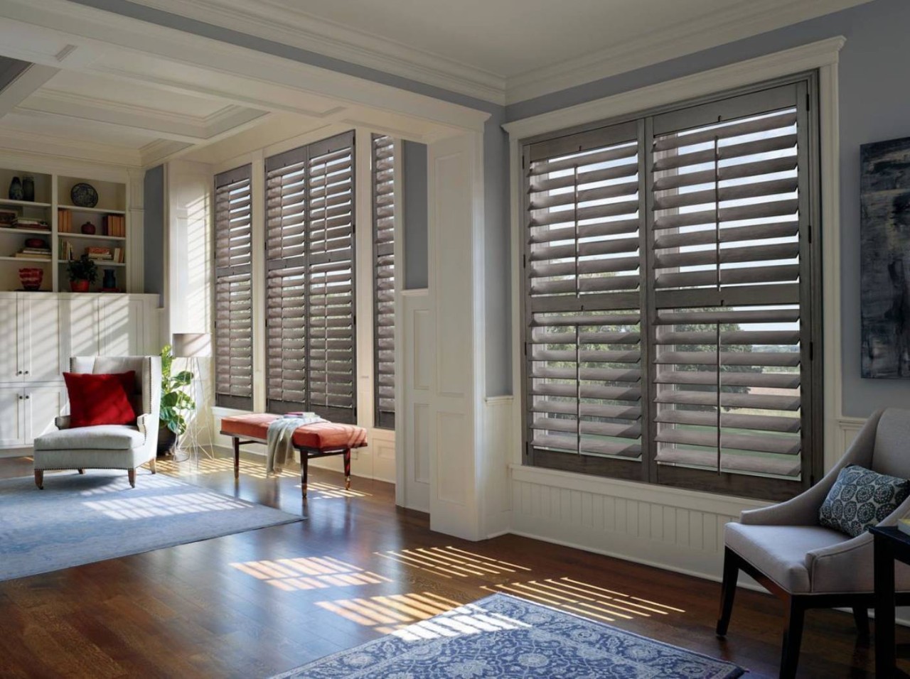Gray Hunter Douglas Heritance® Wood Shutters with Open Louvers in a Traditional Living Room near Boone, NC